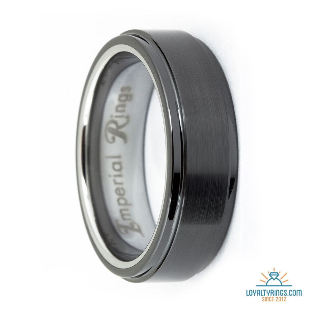Black tungsten carbide ring with a brushed center, fine border grooves, and a silver-tone interior, 8mm wide