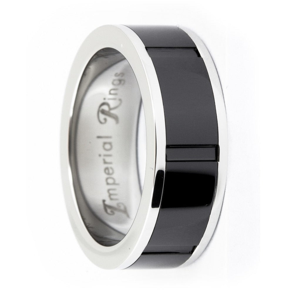 Polished silver-tone stainless steel ring with a black ceramic center divided by cross-grooves, 8mm wide, shown at an angle